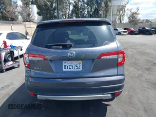 2021 Honda Pilot EX-L with VIN 5FNYF5H57MB046740, listed as a IAAI auction lot 41943366 with 31,198 mi miles and . Bid and sale history available at DreamBid. Image 17.