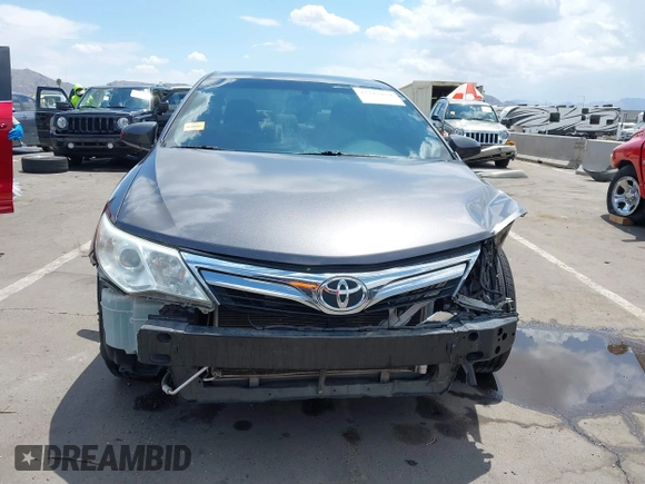 2014 Toyota Camry L with VIN 4T1BF1FK0EU853905, listed as a IAAI auction lot 42217834 with 108,612 mi miles and . Bid and sale history available at DreamBid. Image 12.