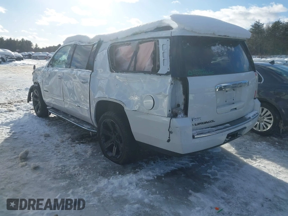 2020 GMC Yukon XL Denali with VIN 1GKS2HKJ3LR223239, listed as a IAAI auction lot 41606846 with 75,452 mi miles. Bid and sale history available at carsss.com. Image 3.