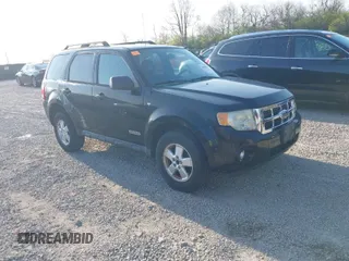 2008 Ford Escape XLT with VIN 1FMCU93138KD65438, listed as a IAAI auction lot 42073549 with 185,343 mi miles. Bid and sale history available at carsss.com. Image 1.