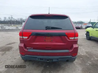 2013 Jeep Grand Cherokee Laredo with VIN 1C4RJEAG4DC573971, listed as a IAAI auction lot 41627288 with 143,256 mi miles. Bid and sale history available at carsss.com. Image 16.