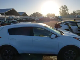 2020 Kia Sportage LX with VIN KNDPM3AC2L7733689, listed as a IAAI auction lot 41858043 with 93,979 mi miles and . Bid and sale history available at DreamBid. Image 13.