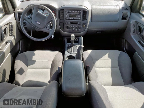 2007 Ford Escape XLS with VIN 1FMYU02Z87KB60530, listed as a Copart auction lot 61273345 with 57,574 mi miles and Salvage title. Bid and sale history available at DreamBid. Image 8.