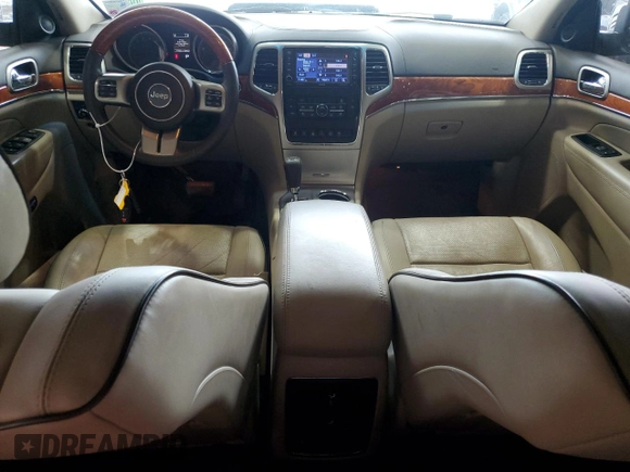 2013 Jeep Grand Cherokee Overland with VIN 1C4RJECT6DC526032, listed as a Copart auction lot 55660905 with 97,406 mi miles and Salvage Title. Bid and sale history available at DreamBid. Image 8.