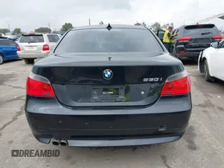 2007 BMW 5 Series 530i with VIN WBANE73577CM57997, listed as a IAAI auction lot 41461292 with 220,424 mi miles. Bid and sale history available at carsss.com. Image 16.