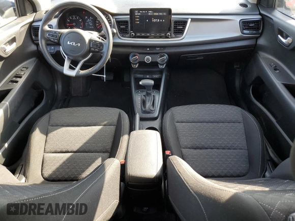 2023 Kia Rio S with VIN 3KPA25AD5PE548218, listed as a Copart auction lot 71808674 with 24,412 mi miles and Salvage Title. Bid and sale history available at DreamBid. Image 8.
