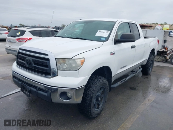 2011 Toyota Tundra 4WD Truck with VIN 5TFUW5F18BX188306, listed as a IAAI auction lot 41898176 with 221,744 mi miles. Bid and sale history available at carsss.com. Image 17.