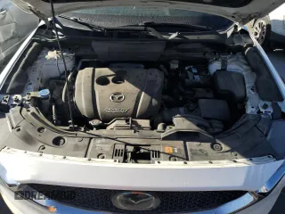 2018 Mazda CX-5 Grand Touring with VIN JM3KFADM3J1410210, listed as a Copart auction lot 44031365 with 69,016 mi miles and Clean Title. Bid and sale history available at DreamBid. Image 12.