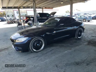 2015 BMW Z4 sDrive28i with VIN WBALL5C54FP557175, listed as a Copart auction lot 48906195 with 28,275 mi miles and Salvage Title. Bid and sale history available at carsss.com. Image 1.