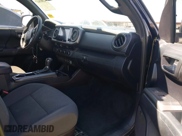 2016 Toyota Tacoma SR with VIN 3TMCZ5AN3GM019210, listed as a IAAI auction lot 42003617 with 171,581 mi miles. Bid and sale history available at carsss.com. Image 5.