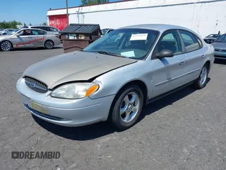 2000 Ford Taurus SES with VIN 1FAFP55U8YG234331, listed as a IAAI auction lot 42797654 with 103,742 mi miles and . Bid and sale history available at DreamBid. Image 2.