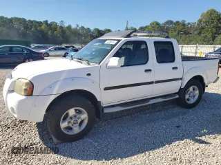 2002 Nissan Frontier SE with VIN 1N6ED27T42C319065, listed as a Copart auction lot 74206474 with 147,724 mi miles and Salvage title. Bid and sale history available at DreamBid. Image 1.