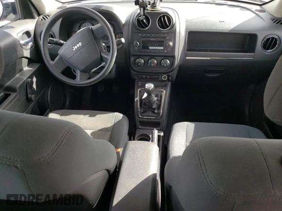 2010 Jeep Patriot Sport z VIN 1J4NT2GB4AD523378, wystawiony jako Copart lot #57088185 z przebiegiem 119 937 mil mil oraz Szkoda całkowita • Salvage title. Historia ofert i sprzedaży dostępna na DreamBid. Obrazek 8.