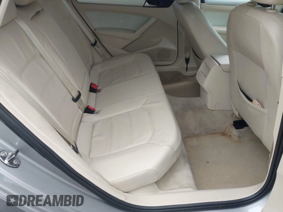 2012 Volkswagen Passat SE with VIN 1VWBH7A36CC077412, listed as a IAAI auction lot 41651796 with 113,259 mi miles and . Bid and sale history available at DreamBid. Image 8.