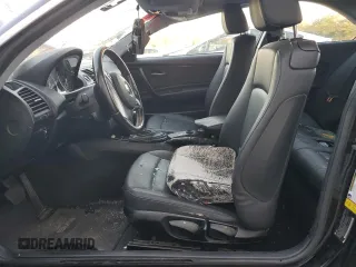 2010 BMW 1 Series 128i with VIN WBAUP9C5XAVL89207, listed as a Copart auction lot 80018904 with 124,842 mi miles and Salvage Title. Bid and sale history available at DreamBid. Image 7.