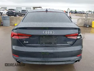 2018 Audi A5 Premium Plus with VIN WAUTNAF56JA049039, listed as a IAAI auction lot 41868983 with 81,551 mi miles and . Bid and sale history available at DreamBid. Image 16.