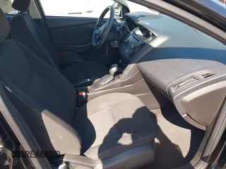 2015 Ford Focus SE with VIN 1FADP3F23FL313614, listed as a IAAI auction lot 42153320 with 121,346 mi miles. Bid and sale history available at carsss.com. Image 5.