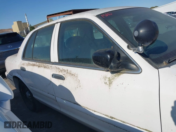 2000 Ford Crown Victoria Police Interceptor z VIN 2FAFP71W7YX104263, wystawiony jako IAAI lot #42442496 z przebiegiem 153 064 mil mil oraz . Historia ofert i sprzedaży dostępna na DreamBid. Obrazek 13.