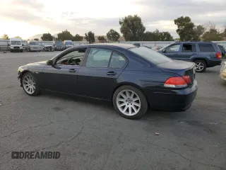 2006 BMW 7 Series 750i with VIN WBAHL83506DT05674, listed as a Copart auction lot 77176834 with 263,495 mi miles and Salvage title. Bid and sale history available at DreamBid. Image 2.