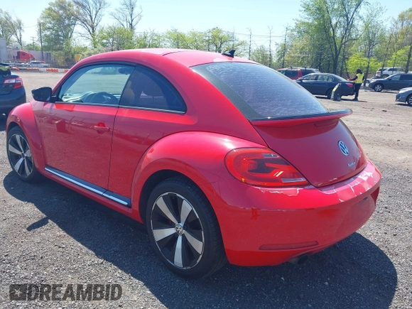 2012 Volkswagen Beetle 2.0T Turbo w/Sun/Snd/Nav PZEV with VIN 3VWVA7AT4CM608798, listed as a IAAI auction lot 42130353 with 152,052 mi miles. Bid and sale history available at carsss.com. Image 3.