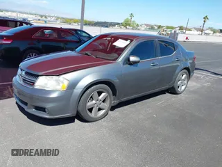 2013 Dodge Avenger SXT with VIN 1C3CDZCG3DN655815, listed as a IAAI auction lot 42190457 with 161,890 mi miles and . Bid and sale history available at carsss.com. Image 2.