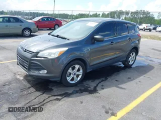 2015 Ford Escape SE with VIN 1FMCU0G75FUC20011, listed as a IAAI auction lot 42113751 with 182,516 mi miles. Bid and sale history available at carsss.com. Image 2.