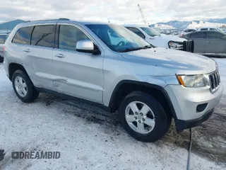 2011 Jeep Grand Cherokee Laredo with VIN 1J4RR4GG7BC584500, listed as a IAAI auction lot 41383355 with 161,722 mi miles. Bid and sale history available at carsss.com. Image 1.