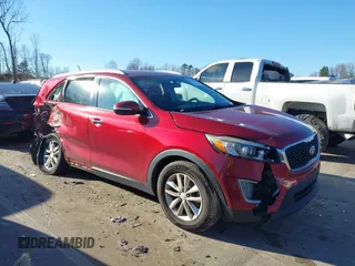 2017 Kia Sorento LX z VIN 5XYPG4A33HG214030, wystawiony jako IAAI lot #41658398 z przebiegiem 169 640 mil mil oraz . Historia ofert i sprzedaży dostępna na DreamBid. Obrazek 1.