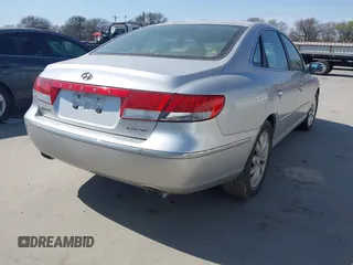 2006 Hyundai Azera SE with VIN KMHFC46FX6A107141, listed as a IAAI auction lot 41793111 with 124,137 mi miles and . Bid and sale history available at DreamBid. Image 4.
