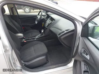 2015 Ford Focus SE with VIN 1FADP3F24FL297665, listed as a IAAI auction lot 41893672 with 105,719 mi miles. Bid and sale history available at carsss.com. Image 5.