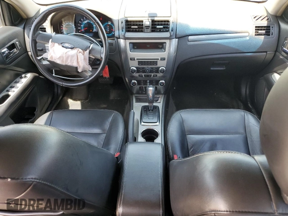 2012 Ford Fusion SEL z VIN 3FAHP0JA1CR182047, wystawiony jako Copart lot #56521525 z przebiegiem 200 523 mil mil oraz Szkoda całkowita • Salvage title. Historia ofert i sprzedaży dostępna na DreamBid. Obrazek 8.