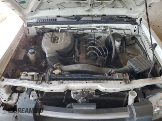 2002 Nissan Frontier XE with VIN 1N6DD26S02C309301, listed as a Copart auction lot 64142805 with 237,523 mi miles and Salvage title. Bid and sale history available at DreamBid. Image 11.
