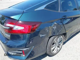 2018 Honda Clarity Touring with VIN JHMZC5F39JC022655, listed as a IAAI auction lot 42149002 with 118,913 mi miles. Bid and sale history available at carsss.com. Image 17.