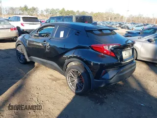 2021 Toyota C-HR LE with VIN JTNKHMBX1M1118203, listed as a IAAI auction lot 40936962 with 18,424 mi miles. Bid and sale history available at carsss.com. Image 3.