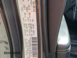 2015 Dodge Durango SXT with VIN 1C4RDJAGXFC750736, listed as a Copart auction lot 48340785 with 209,361 mi miles and Salvage Title. Bid and sale history available at DreamBid. Image 14.