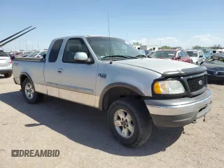 2002 Ford F-150 XL с VIN 1FTRX18L02NA22576, выставлен на аукционе Copart как лот 52985795 с пробегом Не указан миль и Списание • Salvage title. История ставок и продаж доступна на DreamBid. Изображение 4.