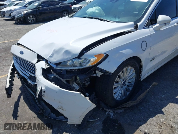 2016 Ford Fusion Energi SE Luxury with VIN 3FA6P0PU7GR206589, listed as a IAAI auction lot 42002565 with 215,789 mi miles. Bid and sale history available at carsss.com. Image 12.
