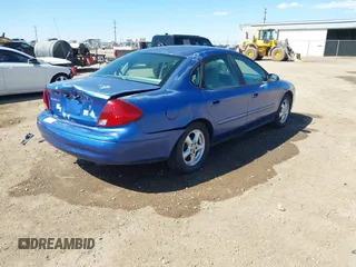 2003 Ford Taurus SE Standard with VIN 1FAFP53U23A251835, listed as a IAAI auction lot 41751323 with 119,660 mi miles. Bid and sale history available at carsss.com. Image 4.