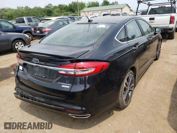 2017 Ford Fusion Titanium с VIN 3FA6P0K93HR170257, выставлен на аукционе Copart как лот 50977791 с пробегом 96 692 миль миль и Списание • Salvage title. История ставок и продаж доступна на DreamBid. Изображение 4.