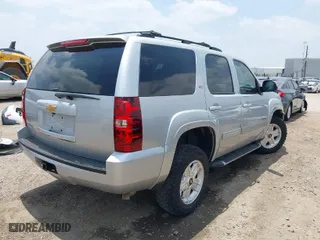 2013 Chevrolet Tahoe LT with VIN 1GNSKBE02DR110158, listed as a IAAI auction lot 36846228 with 125,426 mi miles. Bid and sale history available at carsss.com. Image 4.