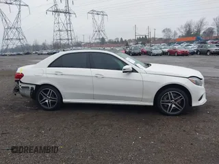 2014 Mercedes-Benz E 550 Sport with VIN WDDHF9BBXEA940995, listed as a IAAI auction lot 41872452 with 50,451 mi miles and . Bid and sale history available at DreamBid. Image 14.