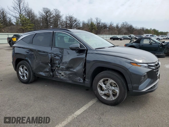2023 Hyundai Tucson SEL with VIN 5NMJBCAE3PH261921, listed as a Copart auction lot 52076995 with 19,558 mi miles and Salvage Title. Bid and sale history available at DreamBid. Image 4.