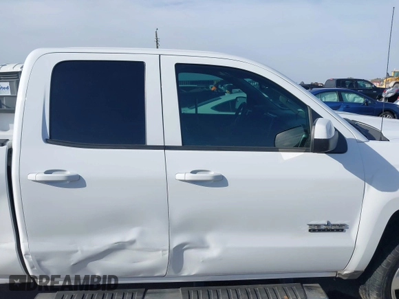 2014 Chevrolet Silverado 1500 LT with VIN 1GCRCREH0EZ399724, listed as a IAAI auction lot 41572451 with 61,799 mi miles and . Bid and sale history available at DreamBid. Image 13.