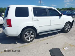 2014 Honda Pilot EX-L with VIN 5FNYF3H75EB015607, listed as a IAAI auction lot 41935074 with 110,713 mi miles and . Bid and sale history available at carsss.com. Image 4.