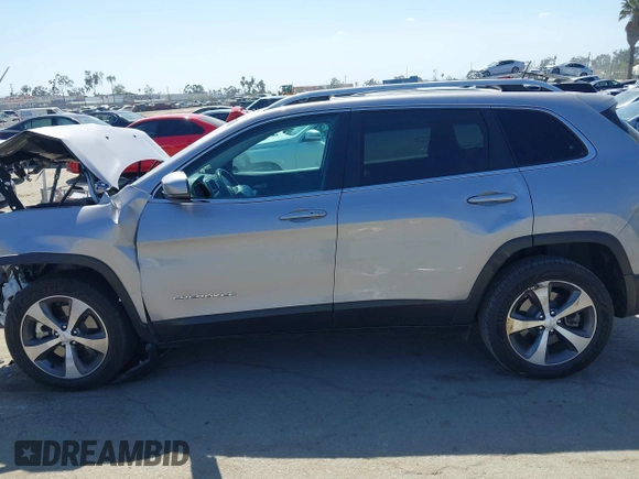 2021 Jeep Cherokee Limited with VIN 1C4PJLDX0MD100067, listed as a IAAI auction lot 42273029 with 84,579 mi miles and . Bid and sale history available at DreamBid. Image 15.