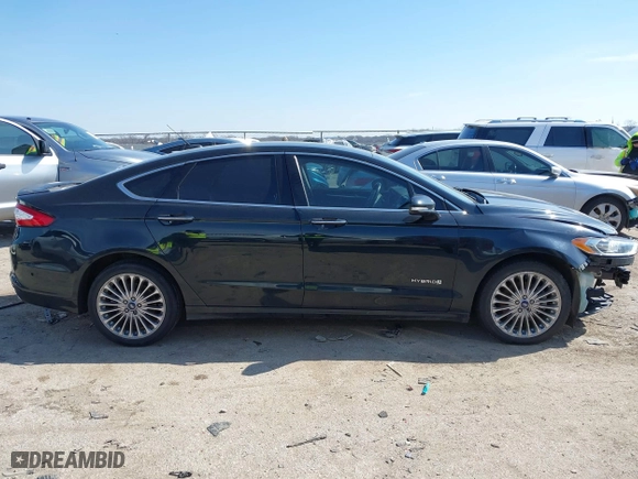 2014 Ford Fusion Titanium Hybrid with VIN 3FA6P0RU9ER111834, listed as a IAAI auction lot 41570337 with 121,099 mi miles. Bid and sale history available at carsss.com. Image 13.
