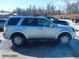 2009 Mercury Mariner Premier with VIN 4M2CU97G49KJ20520, listed as a IAAI auction lot 41581150 with 154,103 mi miles. Bid and sale history available at carsss.com. Image 14.