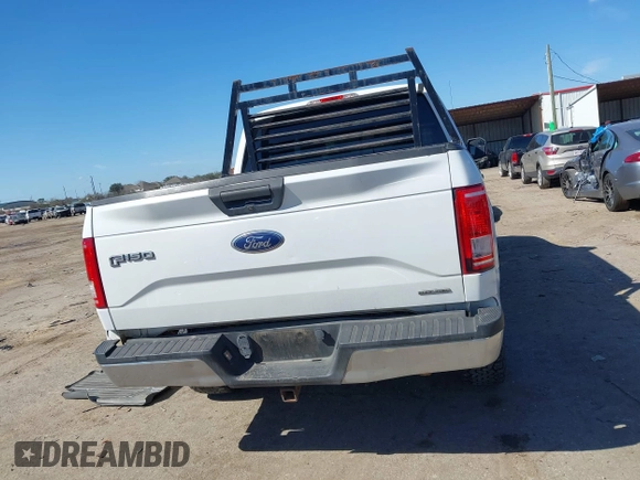 2015 Ford F-150 XLT with VIN 1FTEW1EFXFKE27190, listed as a IAAI auction lot 41670252 with 250,077 mi miles. Bid and sale history available at carsss.com. Image 16.