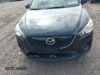2014 Mazda CX-5 Sport with VIN JM3KE4BE4E0426931, listed as a IAAI auction lot 42055582 with 121,418 mi miles. Bid and sale history available at carsss.com. Image 6.