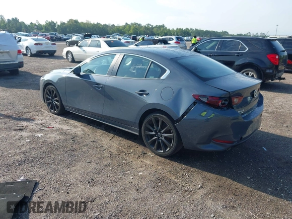 2024 Mazda 3 S Carbon Edition with VIN 3MZBPBCM6RM411828, listed as a IAAI auction lot 42802141 with 40,061 mi miles and . Bid and sale history available at DreamBid. Image 3.